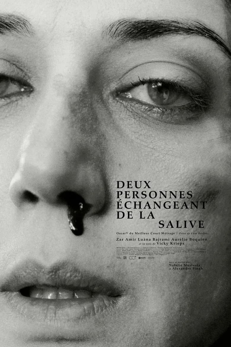 Deux personnes échangeant de la salive